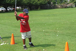 Trying his hand at golf