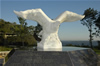 2005 9-11 Memorial dedicated at Mount Mitchill Scenic Overlook. The 9/11 Memorial features a timeline walkway recollecting the day's events; a stone base with the names of the 147 Monmouth County residents who lost thier lives and an eagle sculpture clutching a beam from one of the towers.