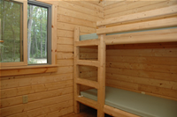 Another photo of the sleeping area inside a cabin