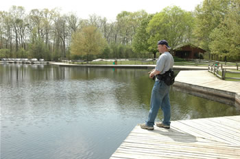 Man fishing at the lake in Turkey Swamp